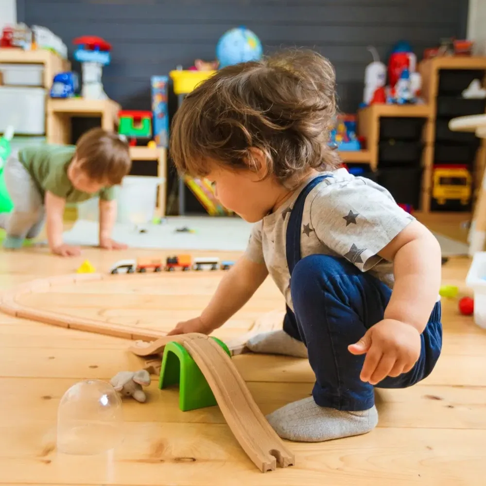 A child playing with a ramp at a Bright Beginnings Academy daycare